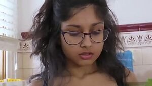 Indian teenage cleaning herself